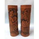 A pair of tall cased bamboo vases
