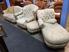 A button back chaise longue, two seater button back settees, an armchair and a footstool