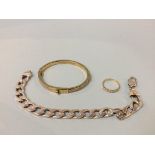 A Michael Kors bangle, a silver bracelet and an 18ct ring, 2.6g