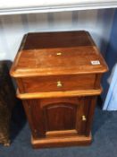 A pair of reproduction bedside cabinets