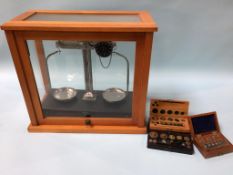 A set of Griffin Chemist scales and three sets of weights