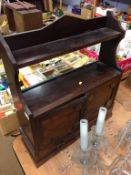 A mahogany wall shelf