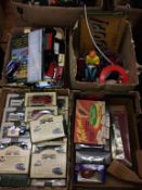 Four boxes of assorted toys