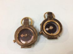 Two military compasses