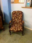 A Victorian mahogany scrolled armchair