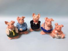 Five Nat West pigs