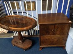 A walnut commode and an occasional table