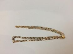 A yellow metal chain, stamped '750' and '18k'