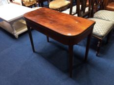 A 19th century mahogany tea table