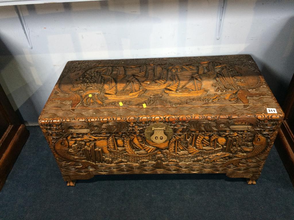 A small Oriental carved chest