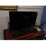 A Panasonic television and sound bar etc.