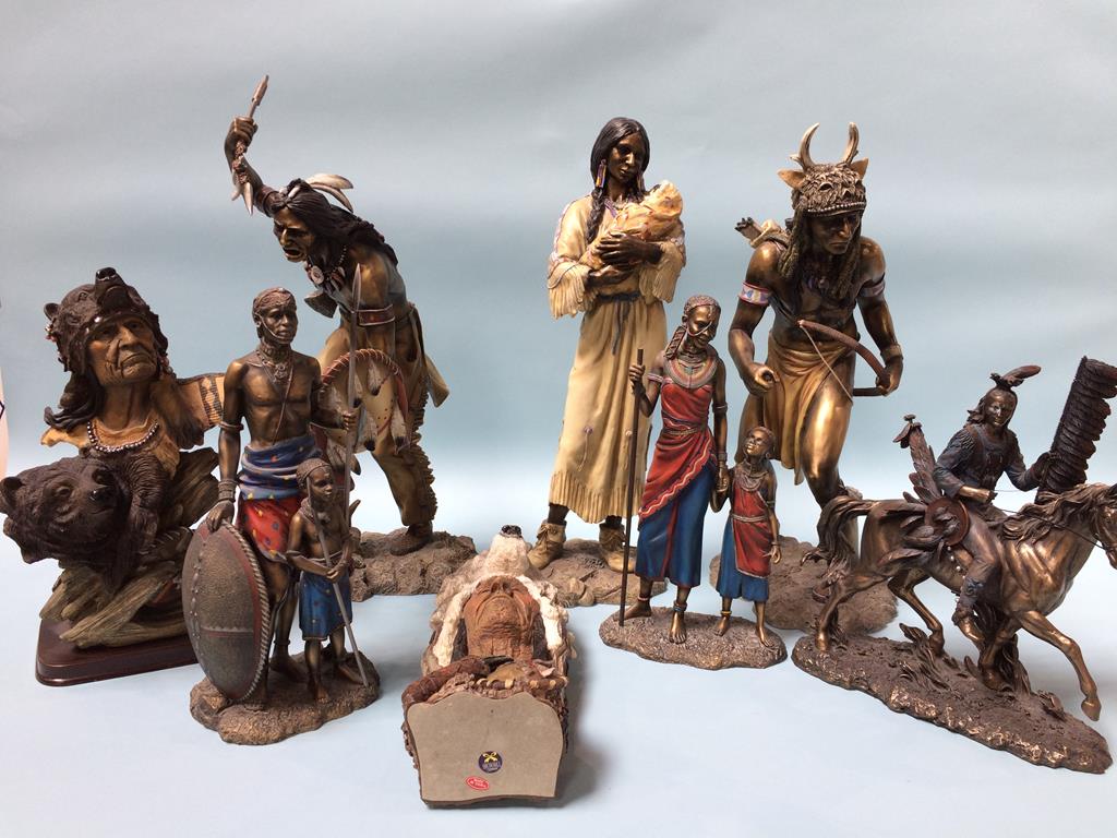 Six model Red Indian figures and two 'Masai' figures