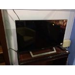 A Sony TV, with remote