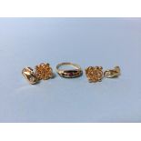 An 18ct gold ring, a pair of earrings 3.5g and another pair of earrings
