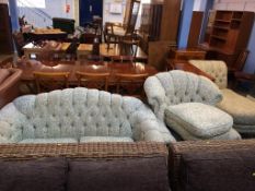 An Edwardian chaise longue, two seater settee, armchair and a footstool
