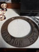 A cast iron circular ring 'The Burrell Traction Engine'