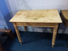 A pine kitchen table