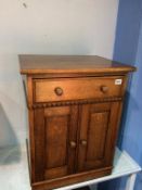 A pair of oak two door cabinets, 49cm width