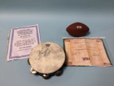 Autographs to include; an Al Pacino signed football and a Kenny G signed tambourine