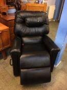 A black leather vibrating, rise and recliner armchair (cost £4700)