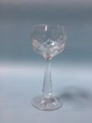 Eleven cut glass wine glasses