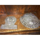 Three lead Insurance wall plaques and another