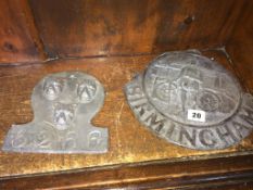 Three lead Insurance wall plaques and another