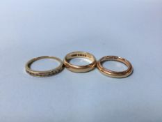 Four 9ct gold rings, 7.8g