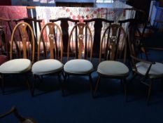 A set of five Ercol dining chairs