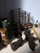 A Miners lamp, model galleon and five various figures