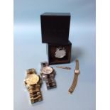 Three Michael Kors wristwatches and one other