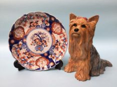 A Beswick Yorkshire Terrier and an Imari plate