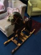 A child's wooden rocking horse