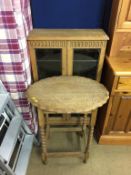 An oak cabinet and occasional table