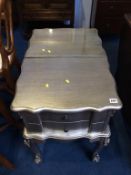 A pair of silver coloured bedside chests, 48cm width