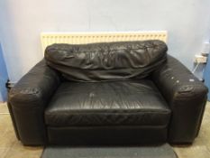 A black leather settee