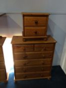 A pine chest of drawers and a bedside chest