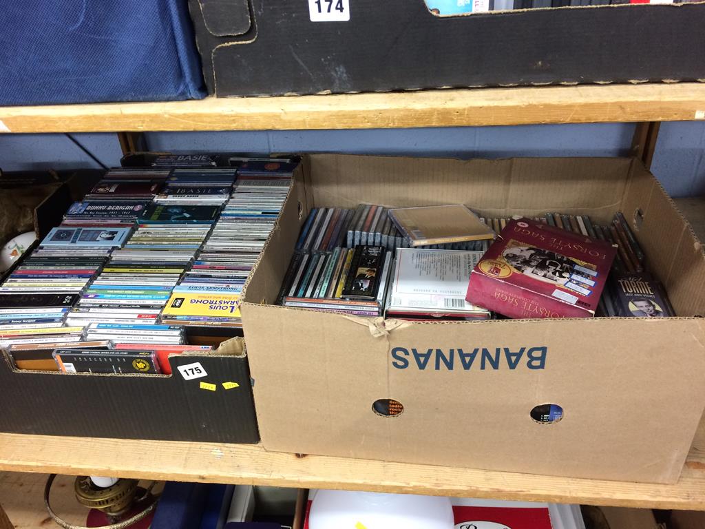 Two boxes of CDs