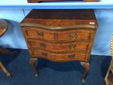 A small walnut serpentine chest of drawers, with cabriole legs, 60cm width