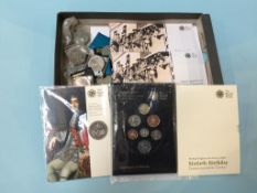 A tray of various coinage, two British Armed Forces special vouchers etc.