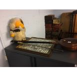 A Womble, warming pan, fire iron, and framed cigarette cards