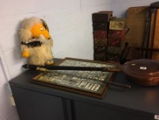 A Womble, warming pan, fire iron, and framed cigarette cards