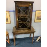 A mahogany fold over tea table and a mahogany hanging corner cabinet