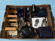 A tray of costume jewellery, dress watches and cuff links etc.