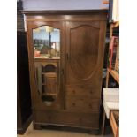 An Edwardian mahogany wardrobe