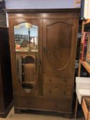 An Edwardian mahogany wardrobe