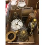 A selection of brass and copper shipping items