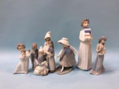 Six Lladro figures and two Nao