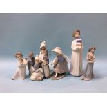 Six Lladro figures and two Nao