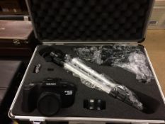 A cased Tamashi camera and accessories and a case of Gruntik Imperial cutlery